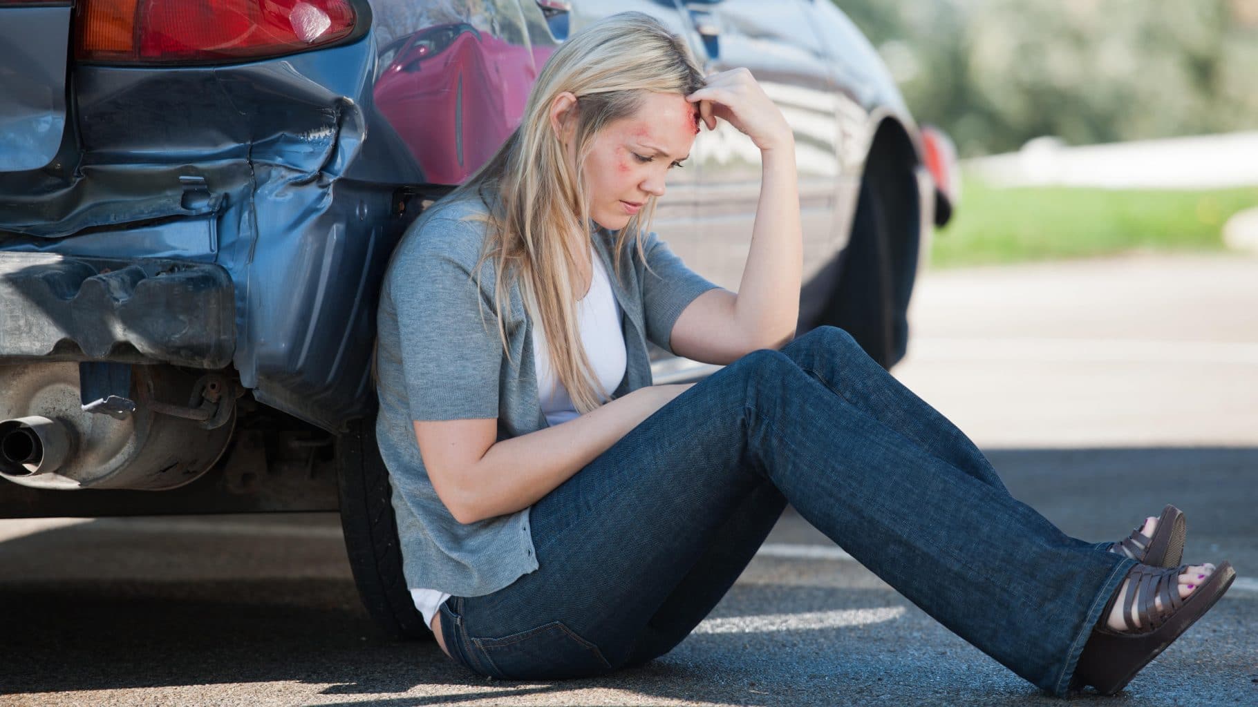 Woman with head injury following rear end accident. If you have been injured in a rear end accident, don't assume the insurance company will give you all of the compensation to which you may be entitled. Protect yourself and talk with a qualified rear end accident lawyer.