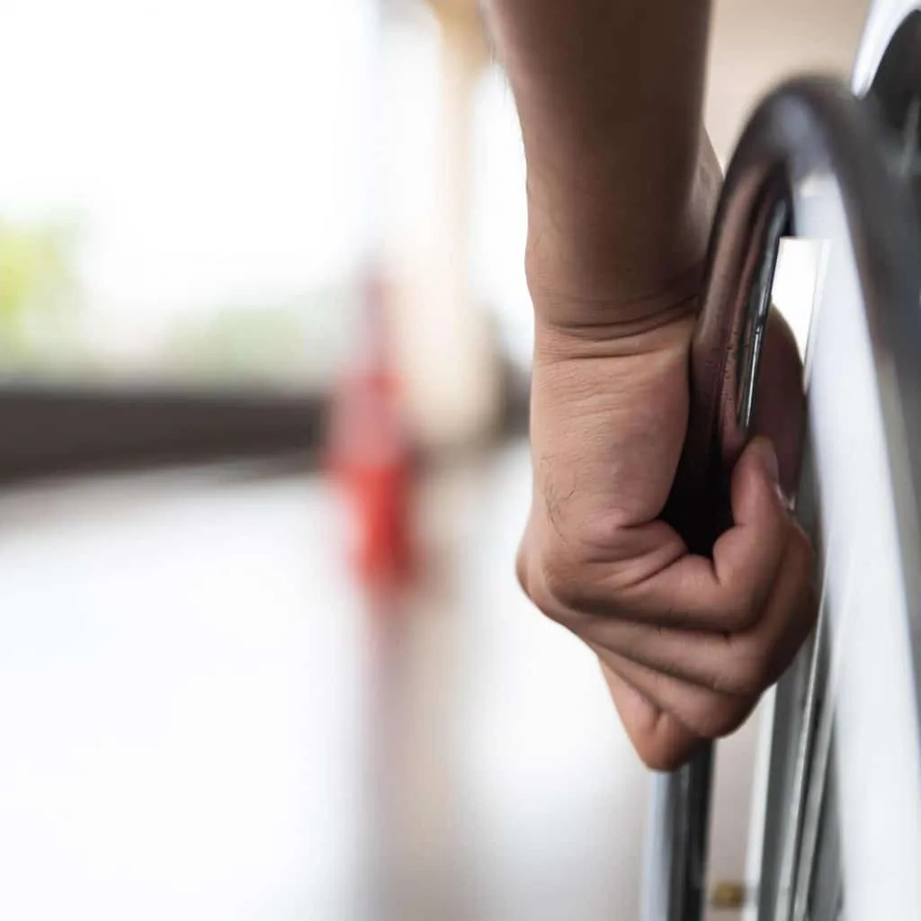 Photo of man's hand propelling a wheelchair. Joseph A. Nagy, injury lawyer in Edmonton, is an experienced spinal cord injury lawyer. He knows how spinal cord injury victims feel and the possible physical outcomes they may face.